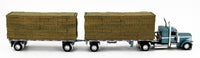 DCP 1:64 *BLUE* Peterbilt 389 w/Utility Dual 28½’ Hay Flatbed Trailers & Load