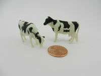 
              ONE DOZEN 1:64th ERTL COWS/CATTLE  *Hereford Angus & Holstein* (12 UNITS) NEW!
            