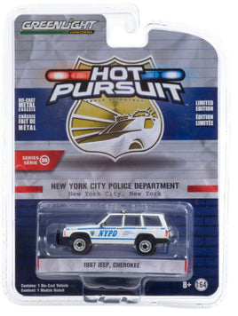 1:64 GreenLight *HOT PURSUIT 38* 1987 Jeep Cherokee NYPD Police Car NIP