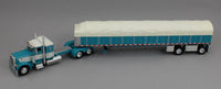 
              DCP 1:64 *TURQUOISE & WHITE* Peterbilt 379 36" Flattop w/Wilson COVERED WAGON Flatbed
            