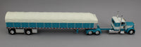 
              DCP 1:64 *TURQUOISE & WHITE* Peterbilt 379 36" Flattop w/Wilson COVERED WAGON Flatbed
            