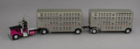 
              DCP 1:64 *BLACK & MAGENTA* Peterbilt 389 w/Double 28' Wilson Livestock Pups NIB
            