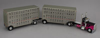 
              DCP 1:64 *BLACK & MAGENTA* Peterbilt 389 w/Double 28' Wilson Livestock Pups NIB
            