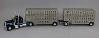 
              DCP 1:64 *BLACK & WHITE* Peterbilt 389 w/Double 28' Wilson Livestock Pups NIB
            