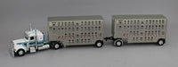 
              DCP 1:64 *WHITE & TEAL* Peterbilt 389 w/Double 28' Wilson Livestock Pups NIB
            