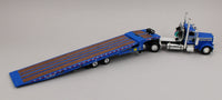 
              DCP 1:64 *BLUE* Peterbilt 389 Day Cab Semi w/LANDOLL 440 Traveling Axle Trailer
            