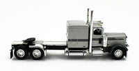 
              2023 DCP 1:64 SILVER GUN METAL Peterbilt 389 63" Flattop w/WILSON GRAIN TRAILER
            